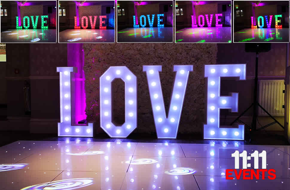 Photo of light up LOVE letters installed at Green House in Bournemouth with different colour variations displayed 