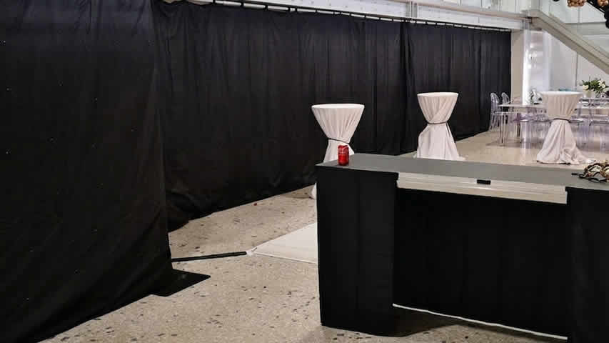 Blackout draping for sectioning off areas created with pipe and drape for an event in the New Forest