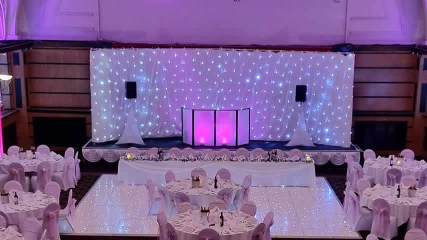 Royal Bath Hotel Bournemouth white starcloth stage backdrop with twinkle LED lights for a wedding