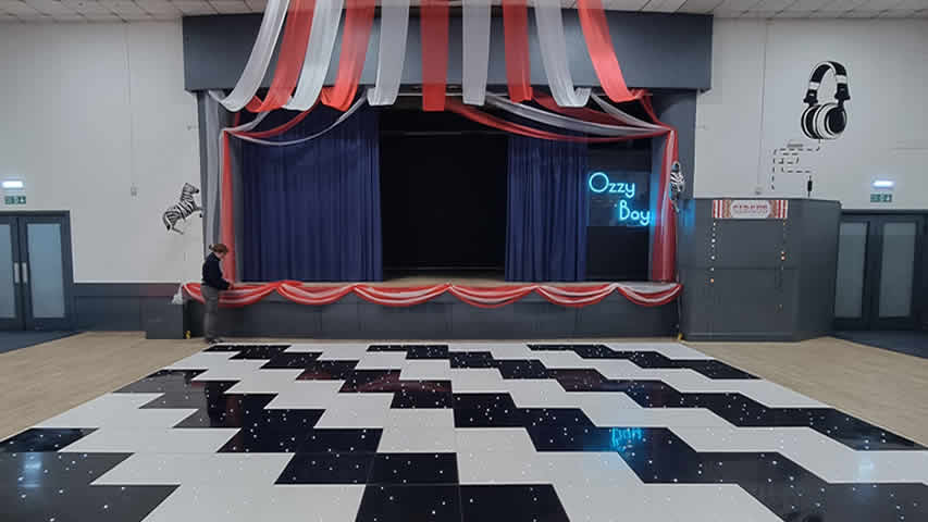 Dorset zig zag dance floor at a starlit awards event with night LED lighting