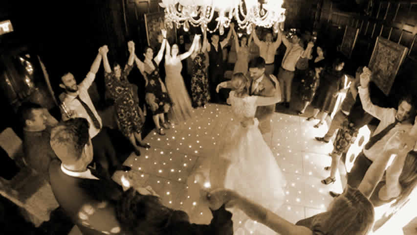 First dance with white starlit dance floor and disco wedding DJ at Bartley Lodge