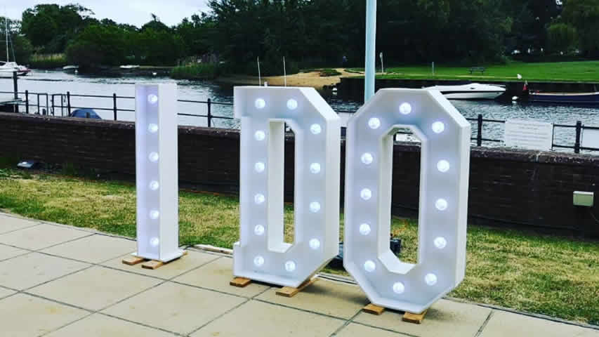 Wedding at Captains Club Hotel & Spa in Christchurch with light up letters I DO