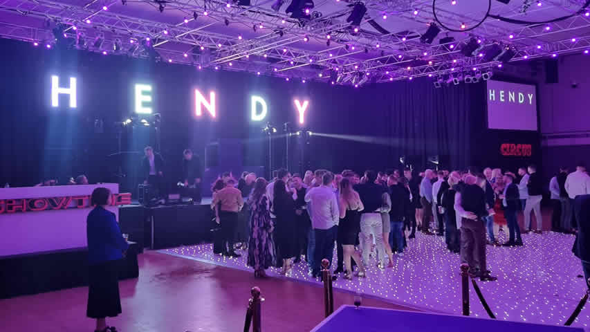 Large white starlit LED dance floor at a Hendy corporate party in Bournemouth BIC Solent Hall
