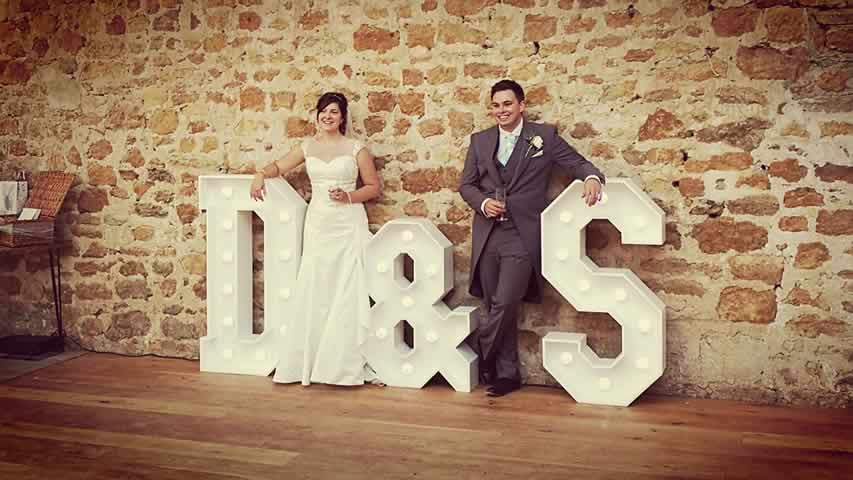 Wedding at Symondsbury Estate with light up letters D & S