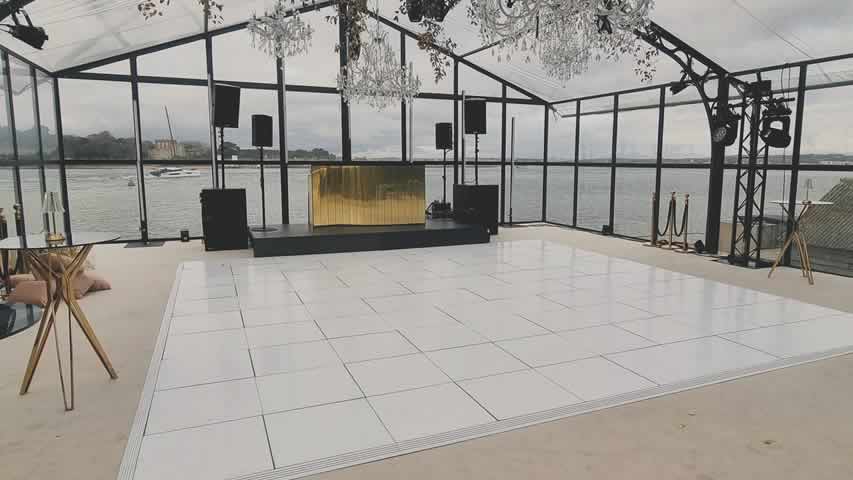 White dance floor at a wedding in Sandbanks Marquee